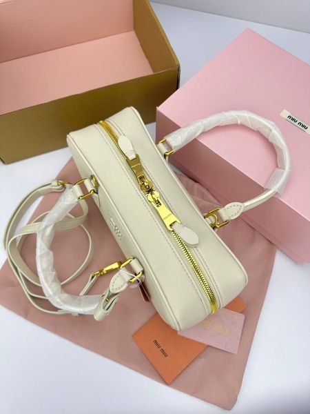 Модель в стилі Miu Miu Milk 28см P17041 фото