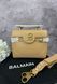 Модель в стилі Balmain Beige Gold Logo