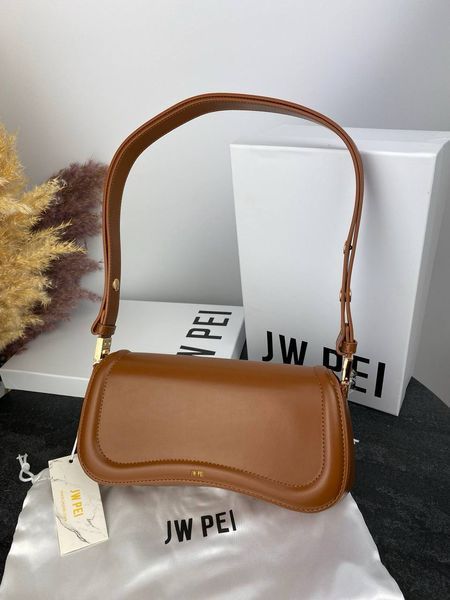 Модель в стилі  JW PEI Brown 26м P8007 фото
